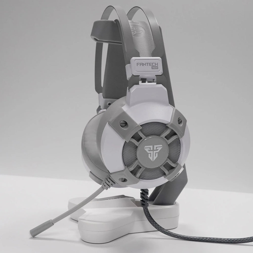 Black FANTECH HG11 gaming headset with RGB lights, large ear cups, and adjustable microphone
