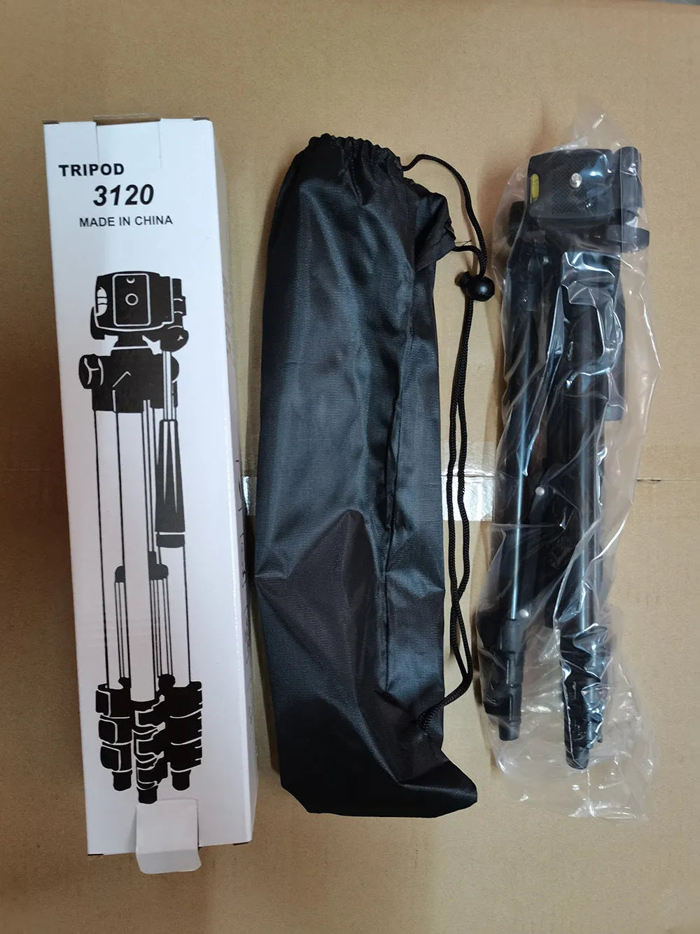Black aluminium alloy camera tripod with quick release plate extended to shooting height