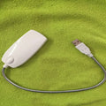 Flexible USB LED reading lamp with gooseneck design and clip attachment in multiple colours