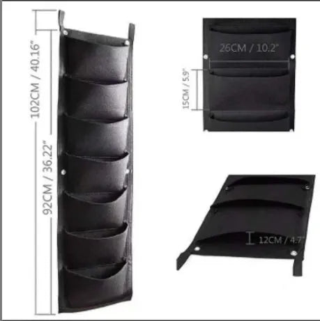 Vertical felt wall garden planter with 18 planting pockets hanging on outdoor wall
