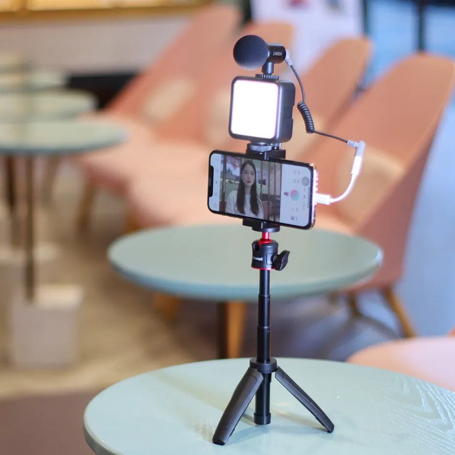 Mobile phone vlog bracket set with adjustable stand, fill light attachment, and selfie stick for video creation