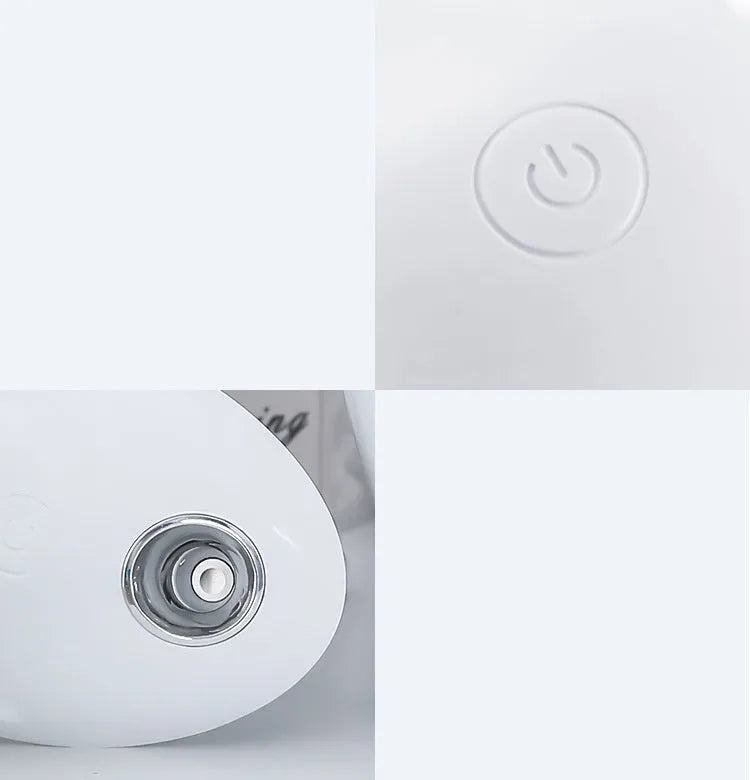 Small white aromatherapy humidifier with USB cable, water tank, and mist output