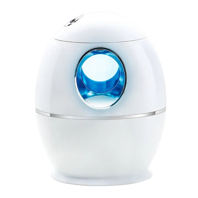 Small white aromatherapy humidifier with USB cable, water tank, and mist output