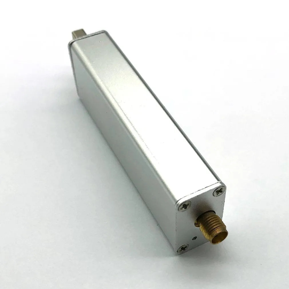 Black all-band software defined radio receiver with gold SMA connector for aviation ADS-B and broadcast signals.
