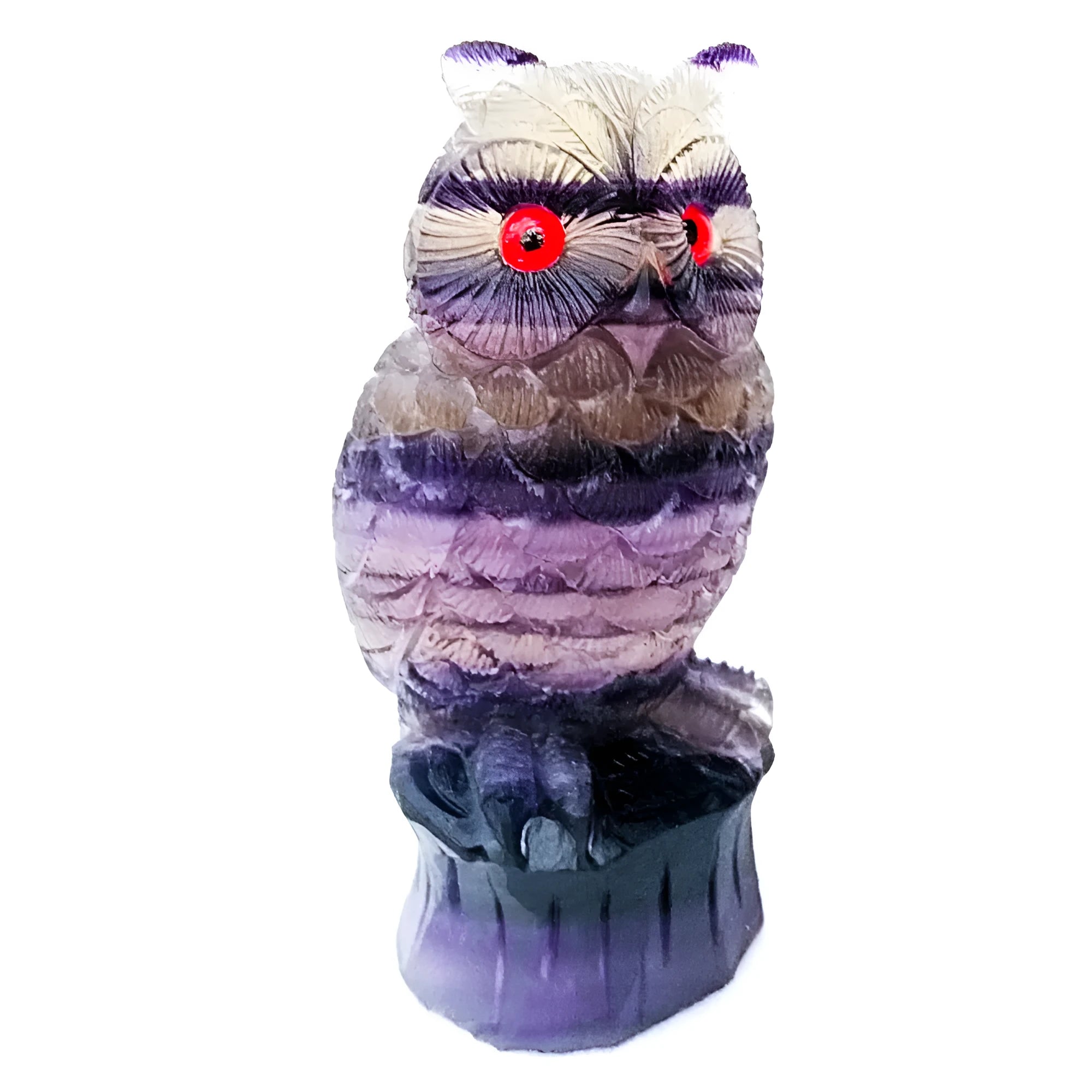 Hand-carved purple fluorite owl ornament on neutral background showing natural stone colouration