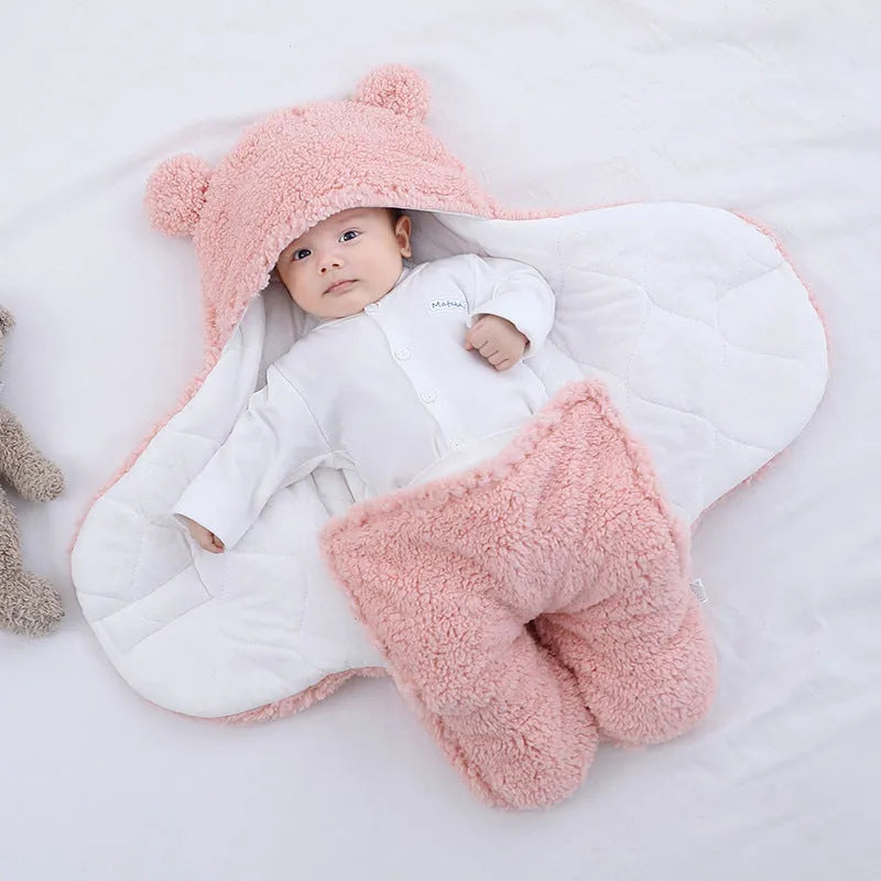 Baby quilted sleeping bag wrapper in cotton blend fabric showing colour options: white, red, grey, light blue, pink, khaki.