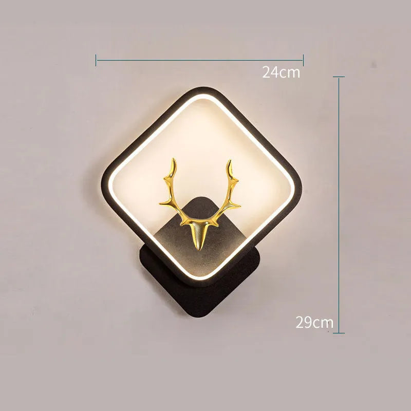 Deer antler wall lamp with remote control on wall showing three lighting colour options