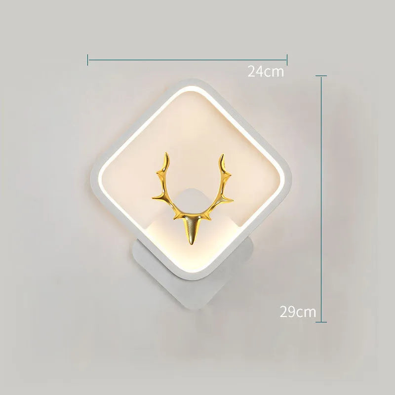 Deer antler wall lamp with remote control on wall showing three lighting colour options