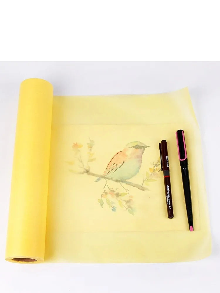 Aikale white sketch paper roll with 30.5cm width shown partially unrolled on a table.