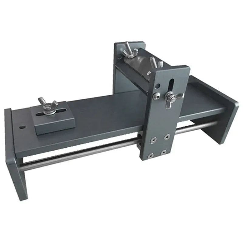 Aluminium alloy fixed angle sharpening tool for woodworking chisels and planers on a workshop bench.
