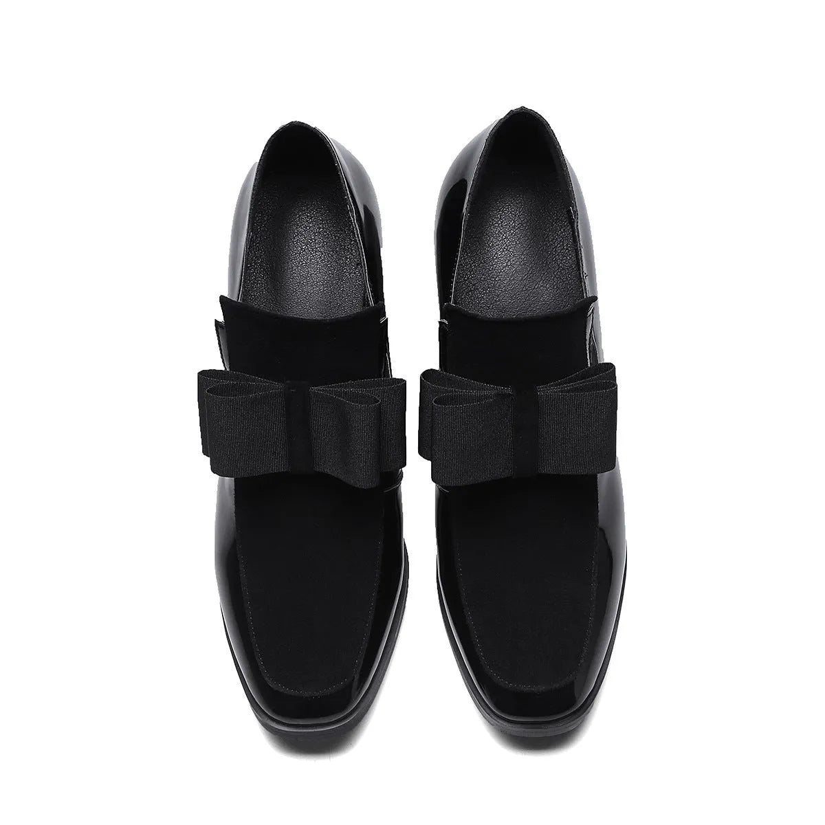 Women's black patent leather high heel with a thick square heel and rubber sole.