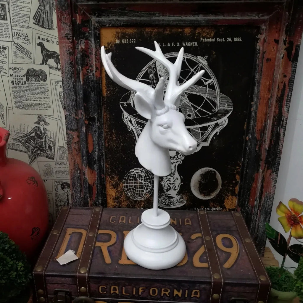 A tall natural resin elephant statue decoration in black, white, or wood colour finish.