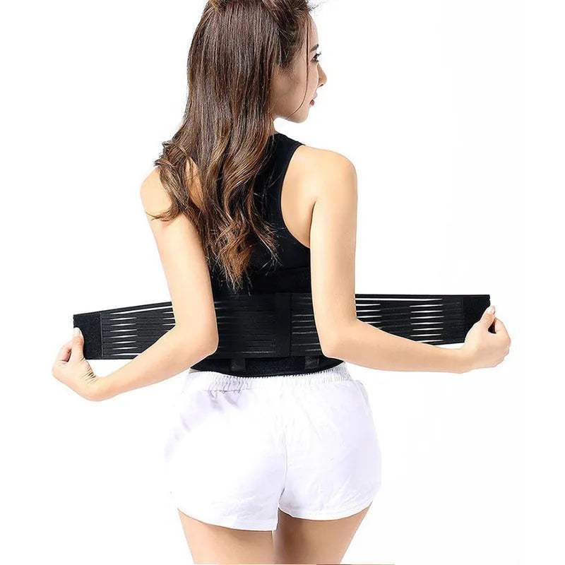 Black self-heating magnetic waist support belt wrapped around a model's lower back.