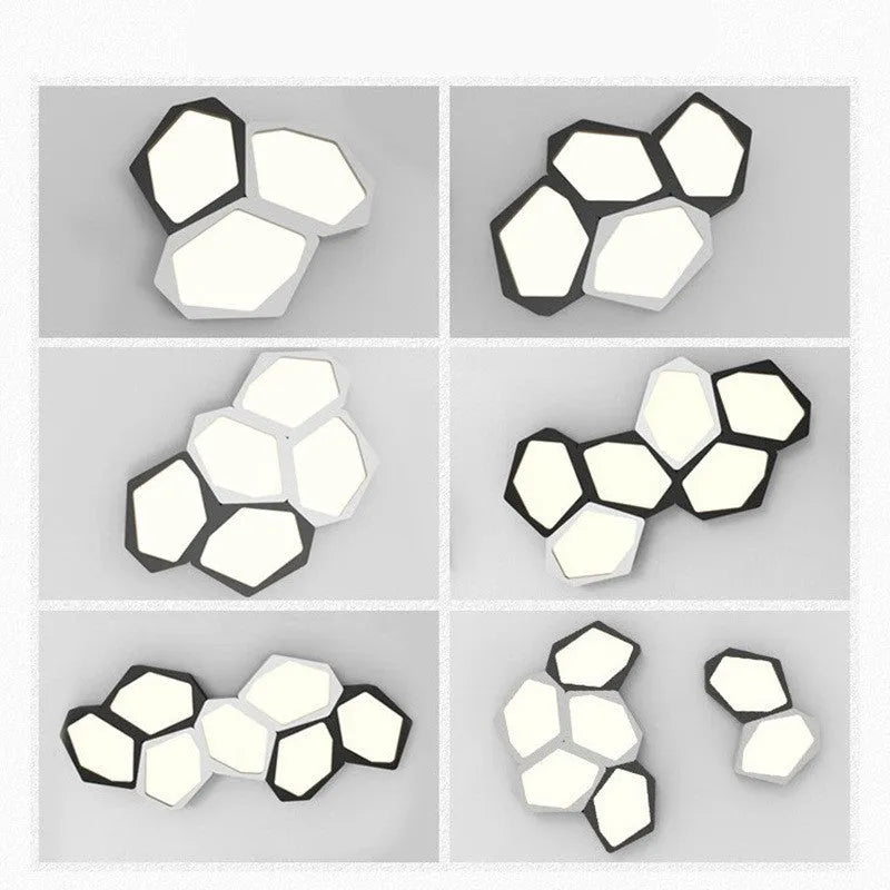 Geometric shaped iron wall light in black or white with remote control for adjustable LED lighting