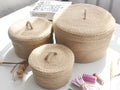 Japanese style linen fabric storage basket with a white cover in small, medium, and large sizes.