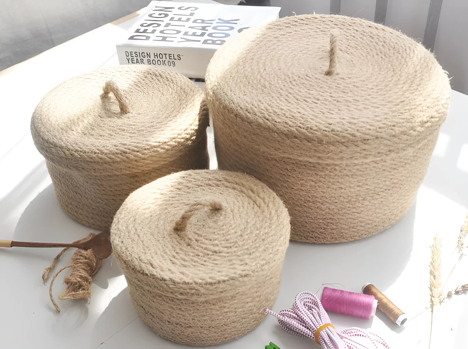 Japanese style linen fabric storage basket with a white cover in small, medium, and large sizes.