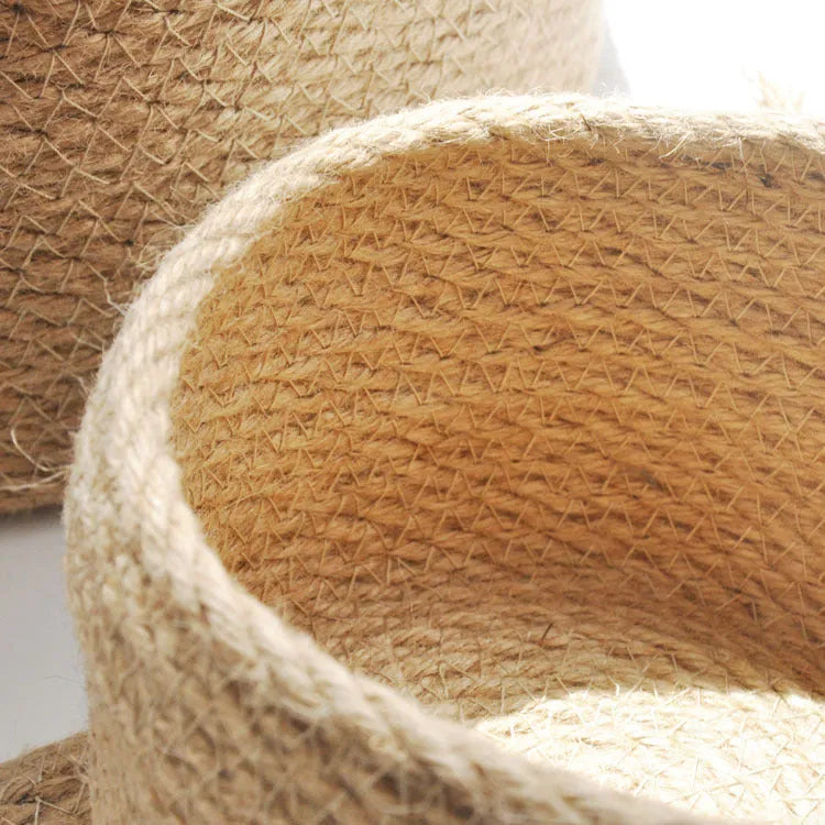 Japanese style linen fabric storage basket with a white cover in small, medium, and large sizes.
