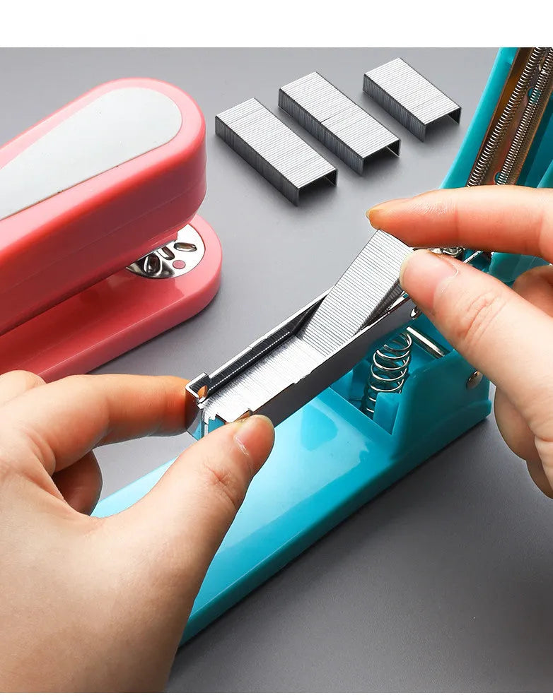 Rotatable stapler shown in dark blue colour, demonstrating its 360-degree spinning head and metal nail outlet.
