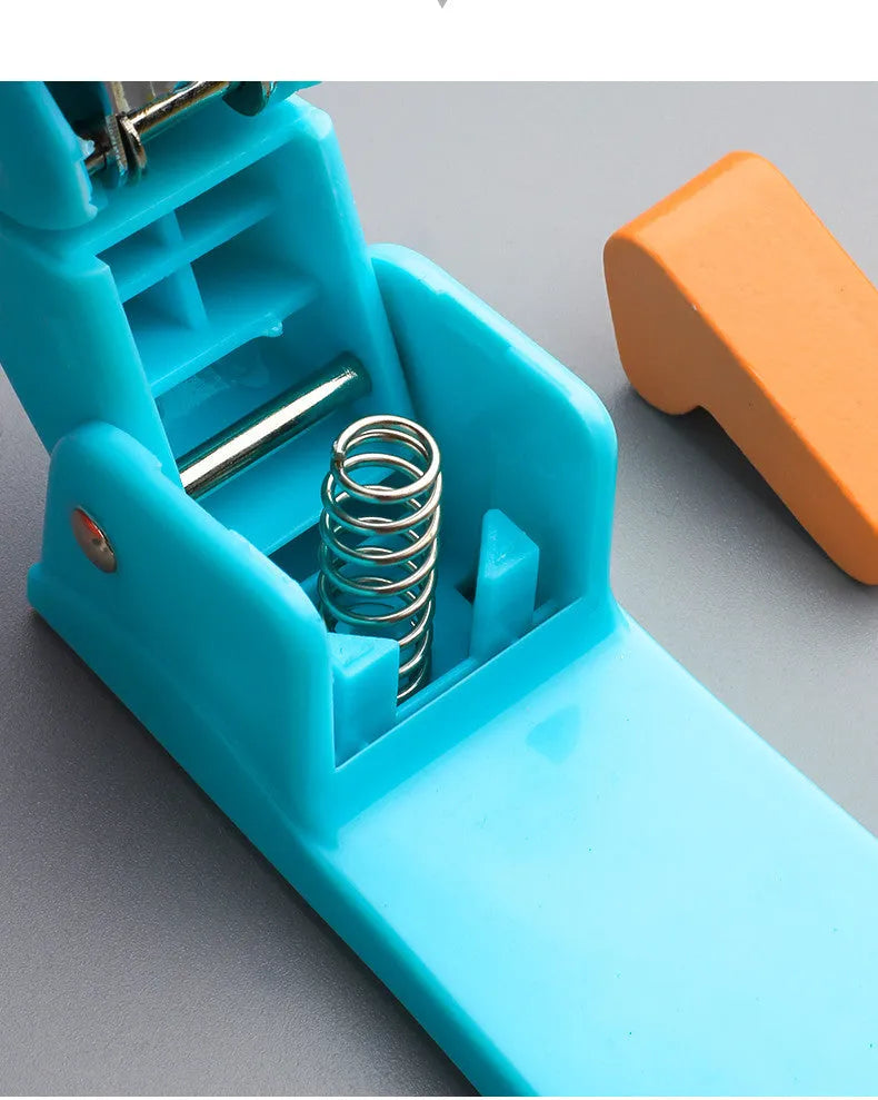 Rotatable stapler shown in dark blue colour, demonstrating its 360-degree spinning head and metal nail outlet.