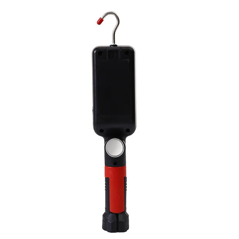 Red portable work light with magnetic base showing USB charging port and COB LED panel
