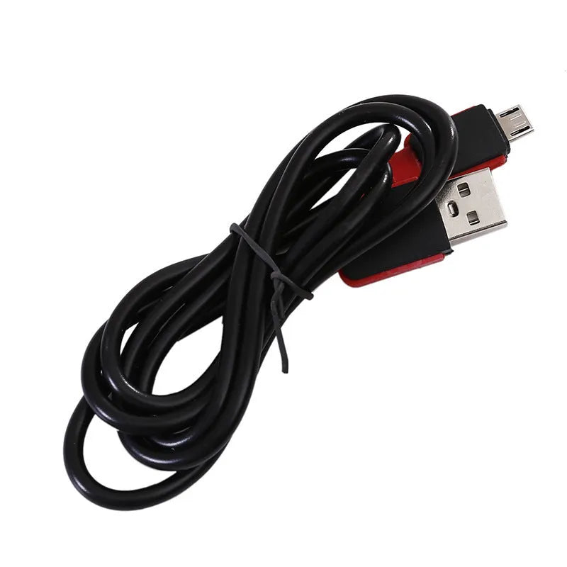 Red portable work light with magnetic base showing USB charging port and COB LED panel