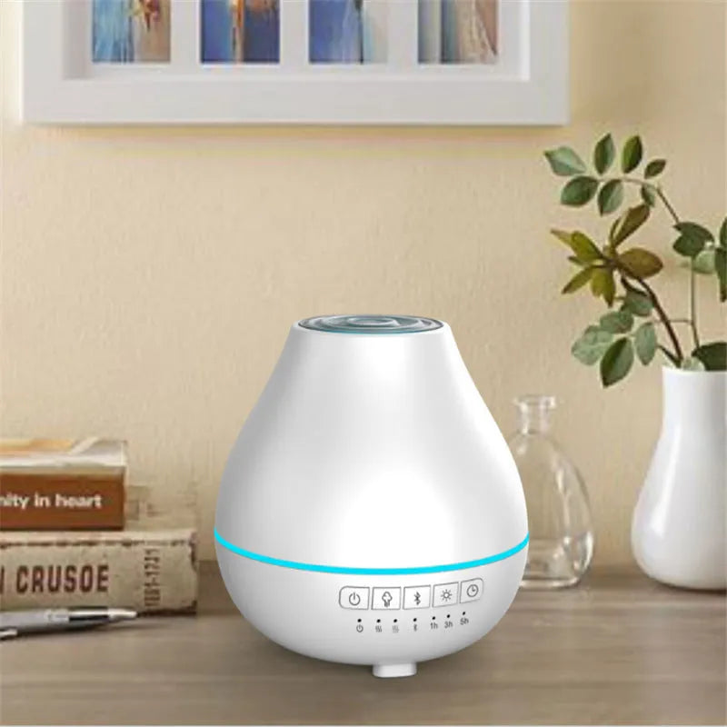 White round Bluetooth humidifier aroma diffuser with LED night light on wooden surface