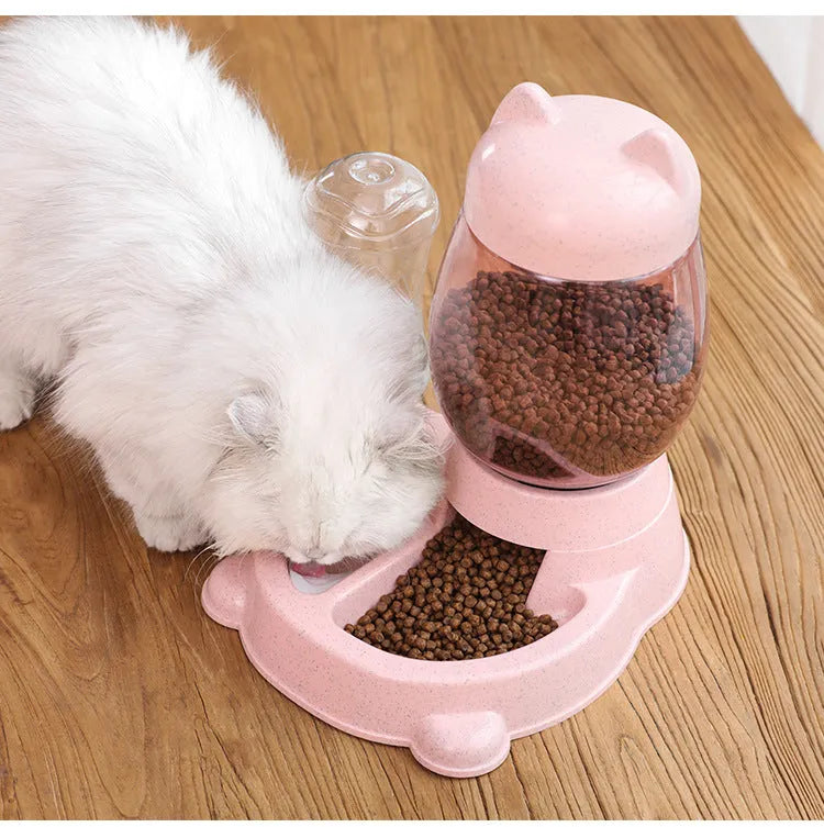 Automatic cat and dog food feeder with blue water dispenser and food tank on a wooden floor