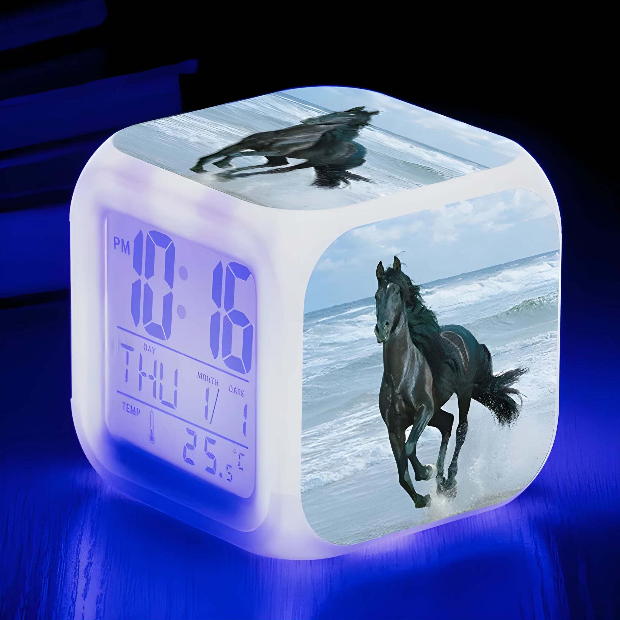 Small square LED alarm clock with colour changing display showing time and thermometer reading