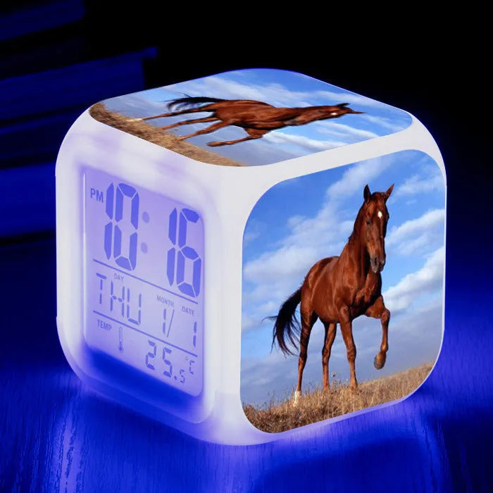Small square LED alarm clock with colour changing display showing time and thermometer reading