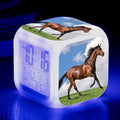 Small square LED alarm clock with colour changing display showing time and thermometer reading
