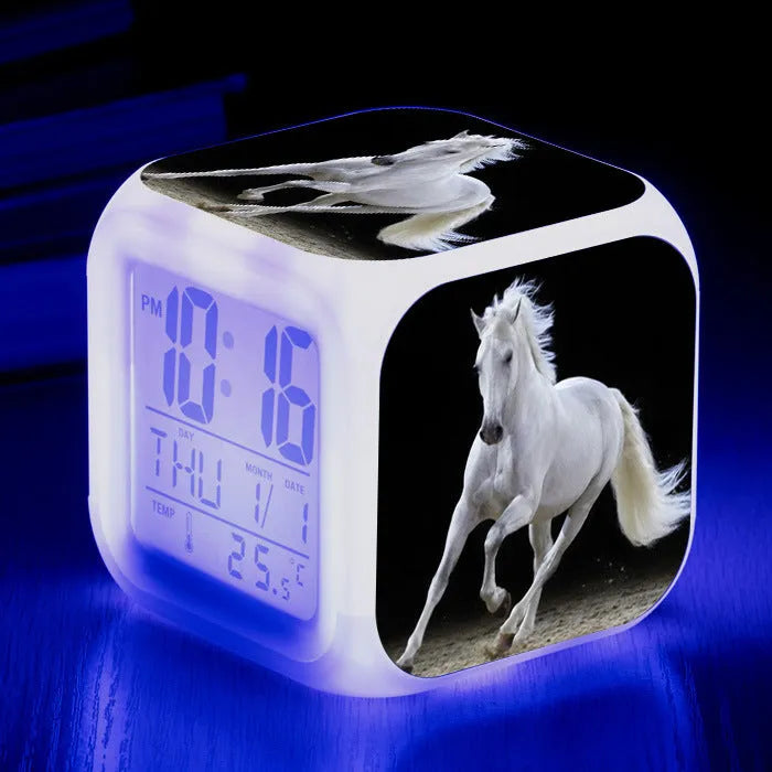 Small square LED alarm clock with colour changing display showing time and thermometer reading