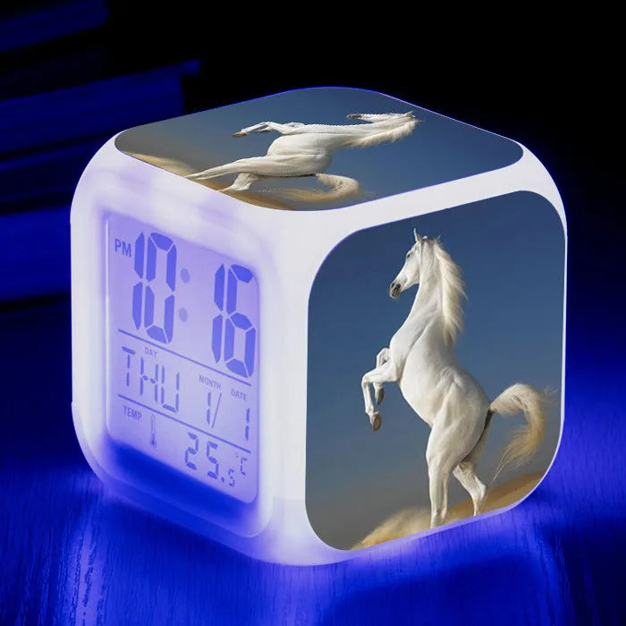 Small square LED alarm clock with colour changing display showing time and thermometer reading