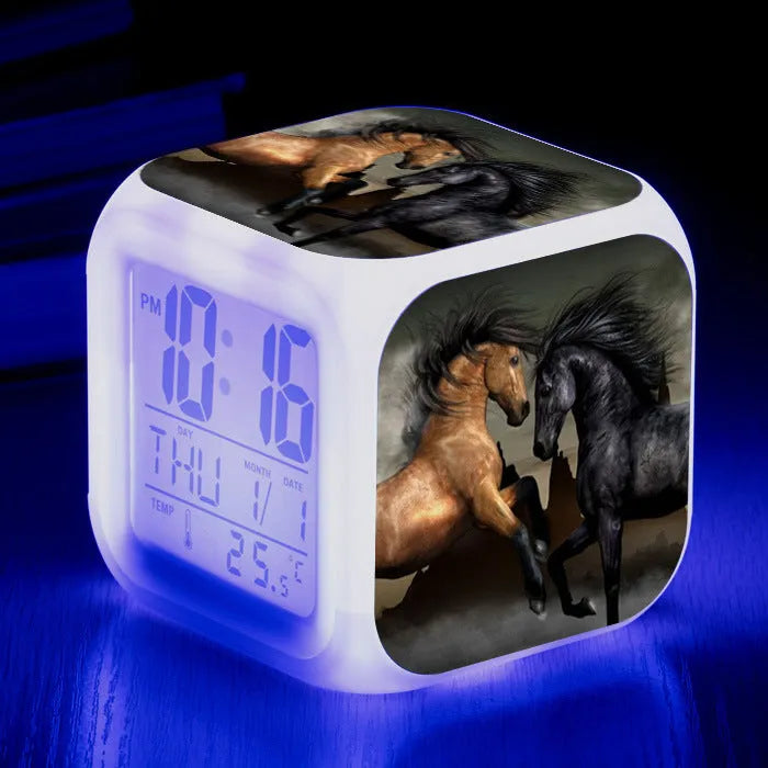Small square LED alarm clock with colour changing display showing time and thermometer reading