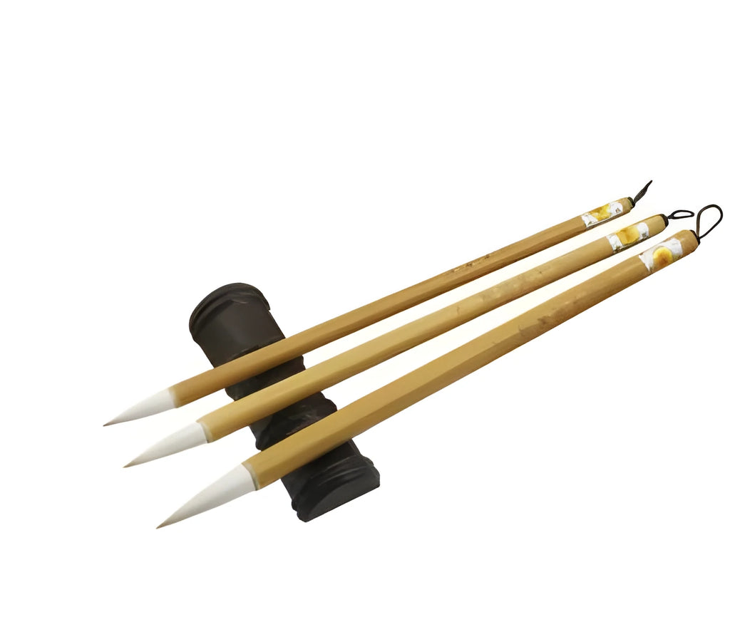 Set of three pure woolen hair Chinese calligraphy brushes with bamboo handles in large, medium and small sizes.