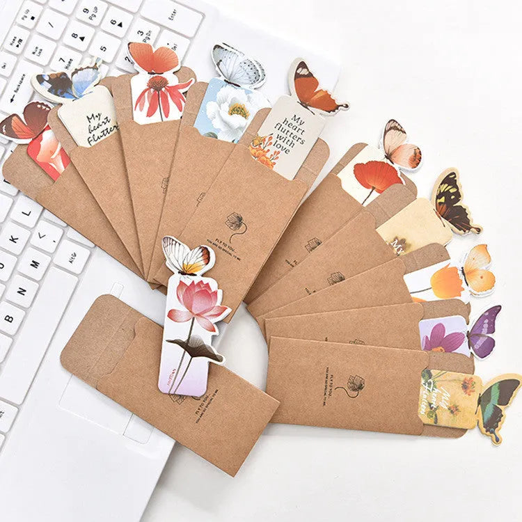 Butterfly-shaped paper bookmark measuring 13.5 by 5.5 centimetres