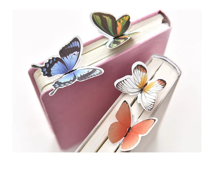 Butterfly-shaped paper bookmark measuring 13.5 by 5.5 centimetres