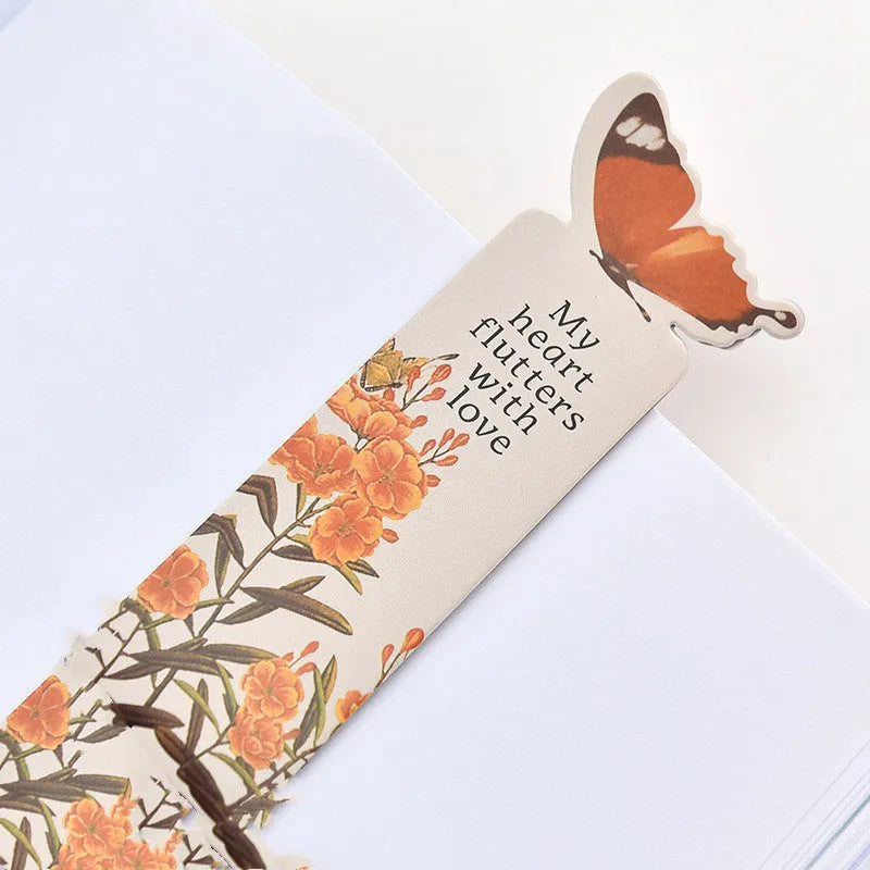 Butterfly-shaped paper bookmark measuring 13.5 by 5.5 centimetres