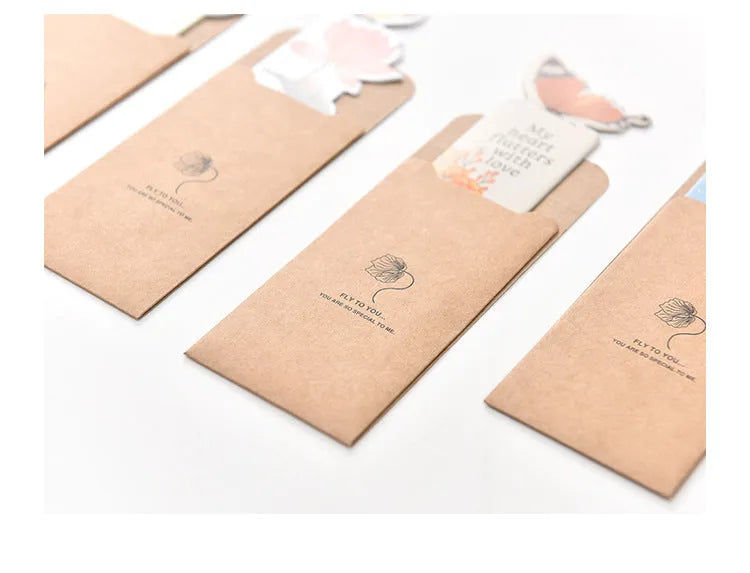 Butterfly-shaped paper bookmark measuring 13.5 by 5.5 centimetres