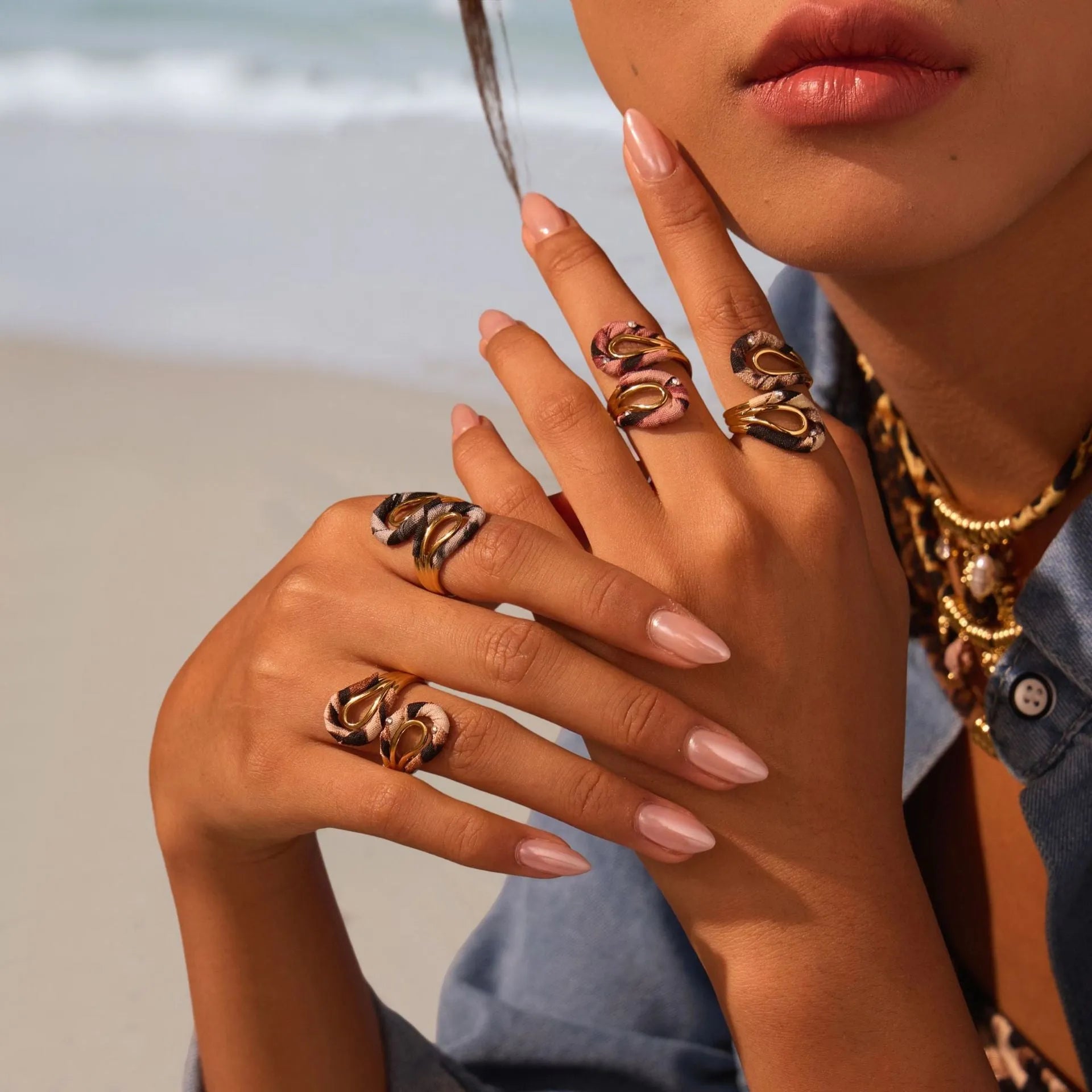 Geometric stainless steel open mouth ring with leopard print patterns in heart and star shapes