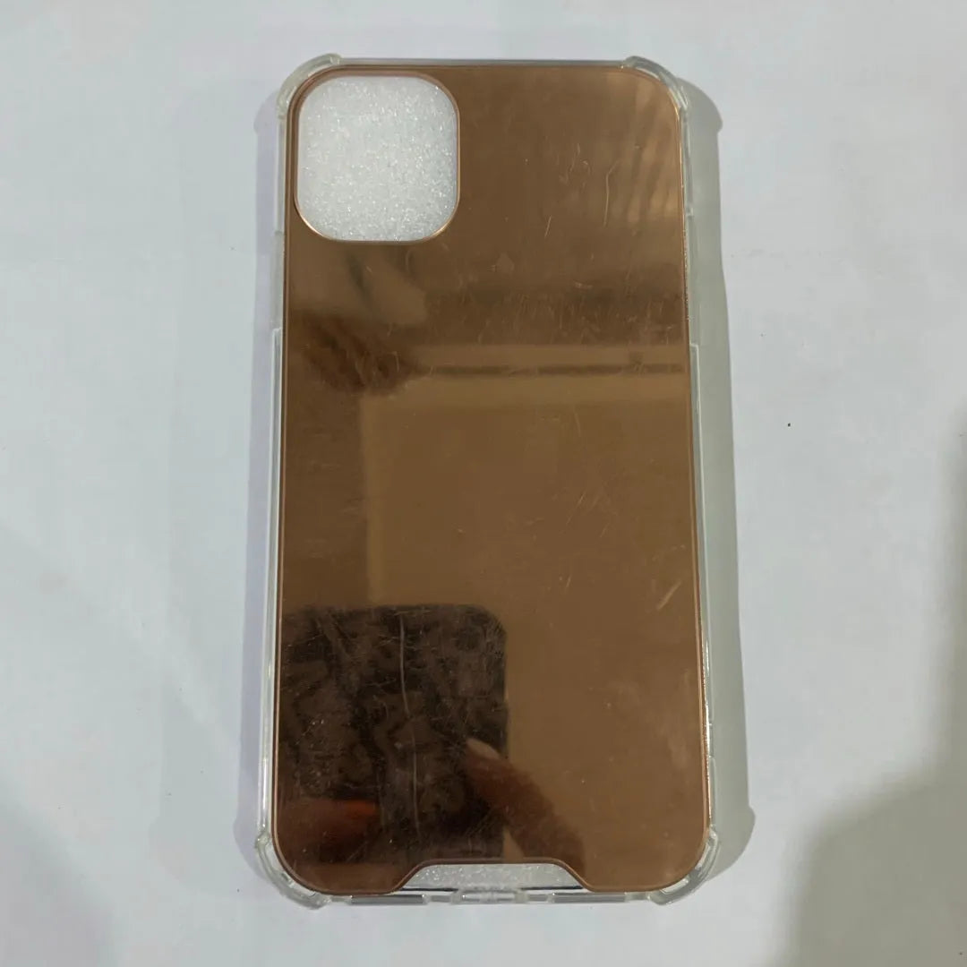Mirrored back protective TPU case for iPhone on a table