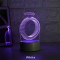 3D diamond ring LED night light with colour-changing modes on black background