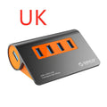 Dark grey aluminium USB-C hub with four USB 3.1 ports and orange accents beside detached 100cm cable