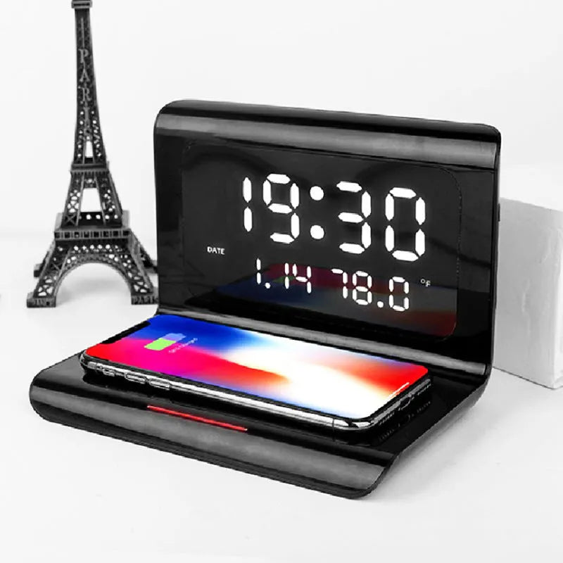 White wireless charger alarm clock showing time, calendar, temperature and humidity on LED display