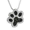 Alloy dog footprint pendant necklace with diamond-encrusted finish on light background