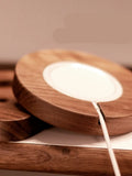 Walnut wood magnetic wireless charging base for iPhone with protective cover