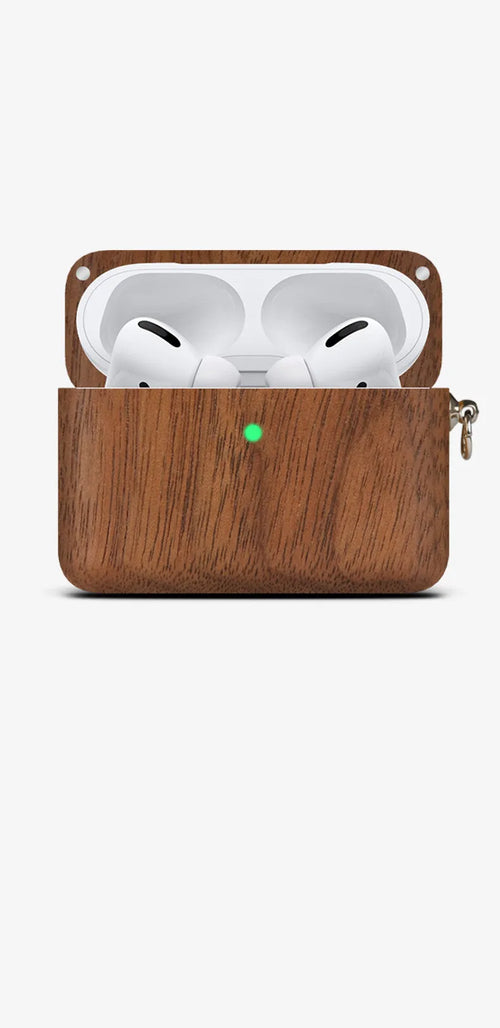 Solid wood Bluetooth earphone sleeve in bamboo colour next to wireless earphones