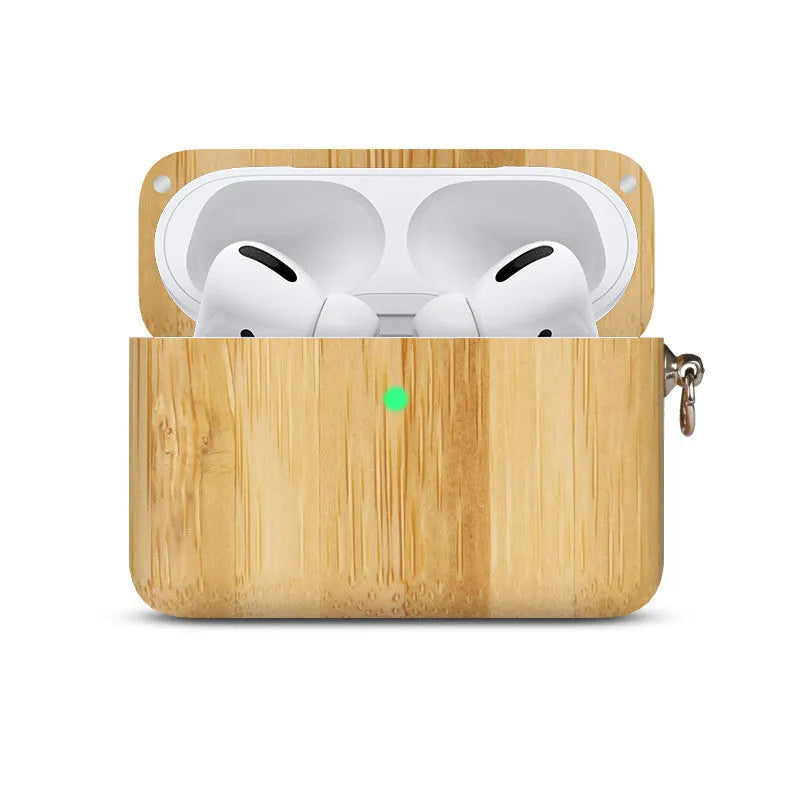 Solid wood Bluetooth earphone sleeve in bamboo colour next to wireless earphones