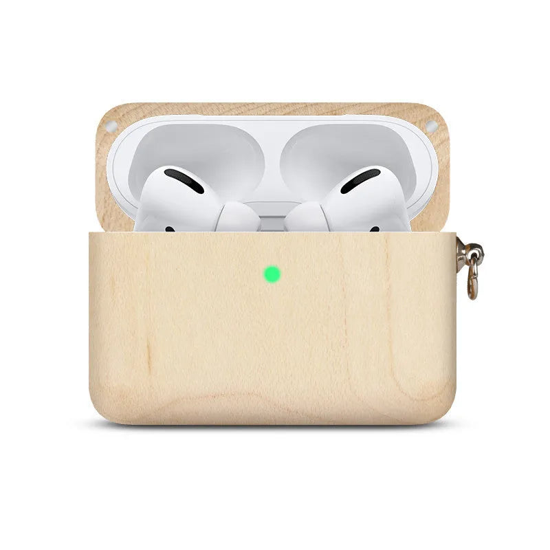Solid wood Bluetooth earphone sleeve in bamboo colour next to wireless earphones