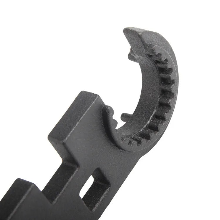 Black all-steel dual-purpose combination wrench for AR15 M4 firearm maintenance.