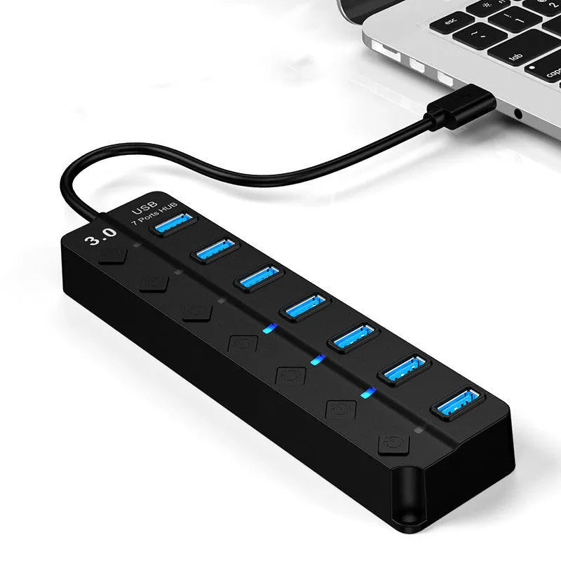 Black 7-port USB 3.0 hub with external power supply unit for computer connectivity expansion